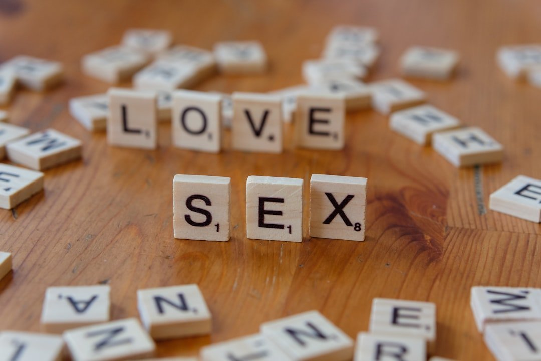 Services a-wooden-table-topped-with-scrabble-letters-spelling-love-and-sex-qkzbueoqlpy