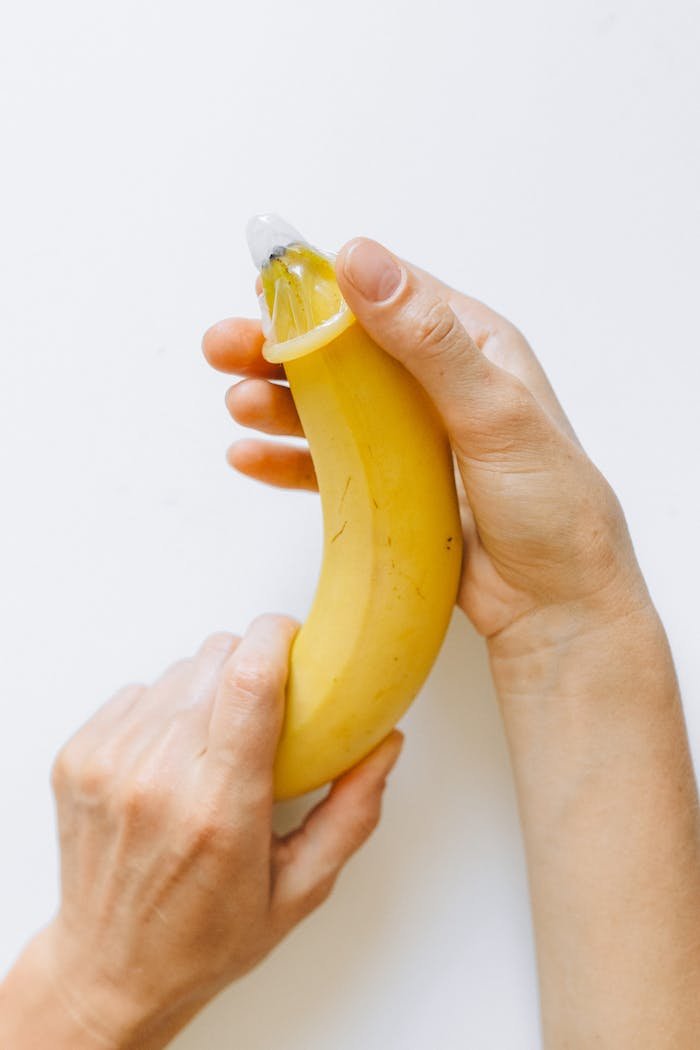 Educational image showing a contraceptive concept with a banana as a tool.